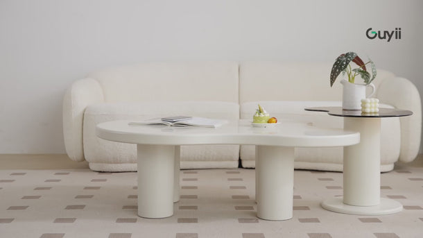 A stylish table set with rounded corners, offering a softer and more inviting design aesthetic.